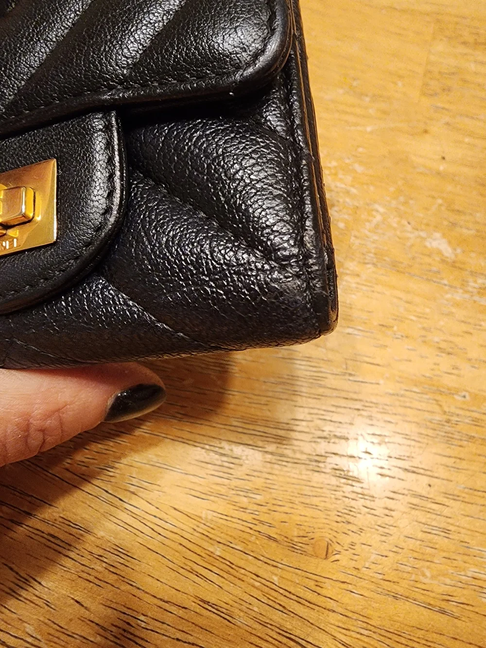 black quilted leather Chanel 2.55 Reissue compact wallet